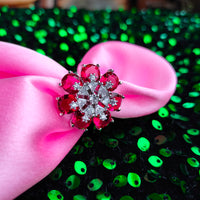 R062_Lovely flower design American Diamond studded statement ring studded with wine red colour stones.