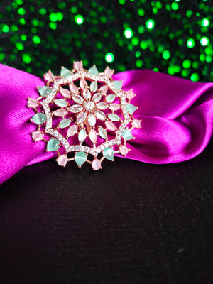 R082_Classic Grand circular design rose gold American Diamond studded statement ring with a touch of green & pink  stones.