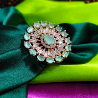 R094_Elegant flowery design circular rose gold American Diamond studded statement ring with a touch of sea green  stones.