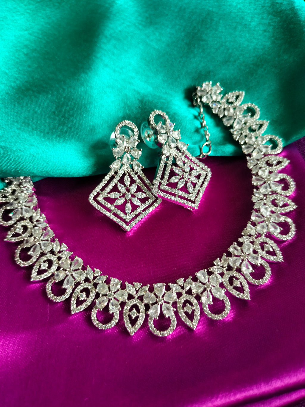 N0594_Lovely design choker necklace embellished with american diamond stones with a touch of pink stones.