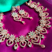 N0601_Elegant flower design choker necklace embellished with american diamond stones  studded with a touch of pink stones.