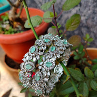 B0350_S_Elegant flowery design Bangles studded with American Diamond stones with a touch of mint green stones with delicate stone work.