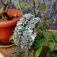 B0350_S_Elegant flowery design Bangles studded with American Diamond stones with a touch of mint green stones with delicate stone work.