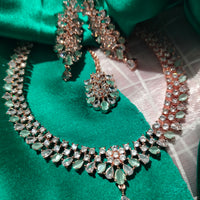 N01130_Lovely designer Rodium polished choker necklace embellished with American diamond stones with delicate white & mint green stone work.