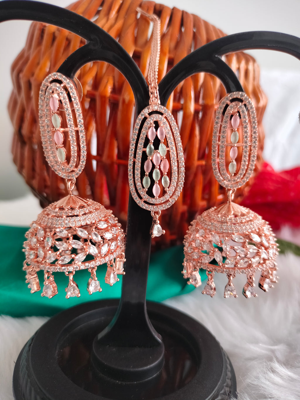 E01013_Ravishing grand layered designer Rose gold hoop Jumkas with Maangtika delicate Multi Colored stone work.