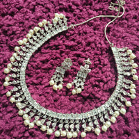 N01147_Grand Lovely designer Silver polished choker necklace embellished with American diamond stones with delicate white and pearl work.