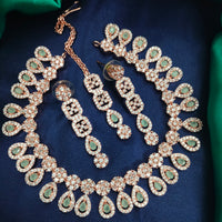 N01173_Grand Lovely designer Rose Gold polished Necklace Set  embellished with American diamond stones with delicate Mint Green Stones .