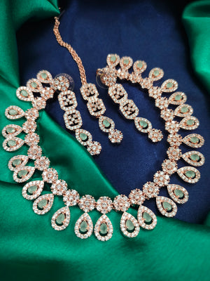 N01173_Grand Lovely designer Rose Gold polished Necklace Set  embellished with American diamond stones with delicate Mint Green Stones .