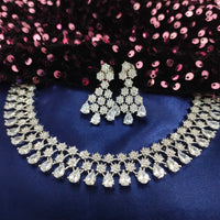 N01180_Grand Lovely designer Silver polished Necklace Set  embellished with American diamond stones with delicate white Stones .