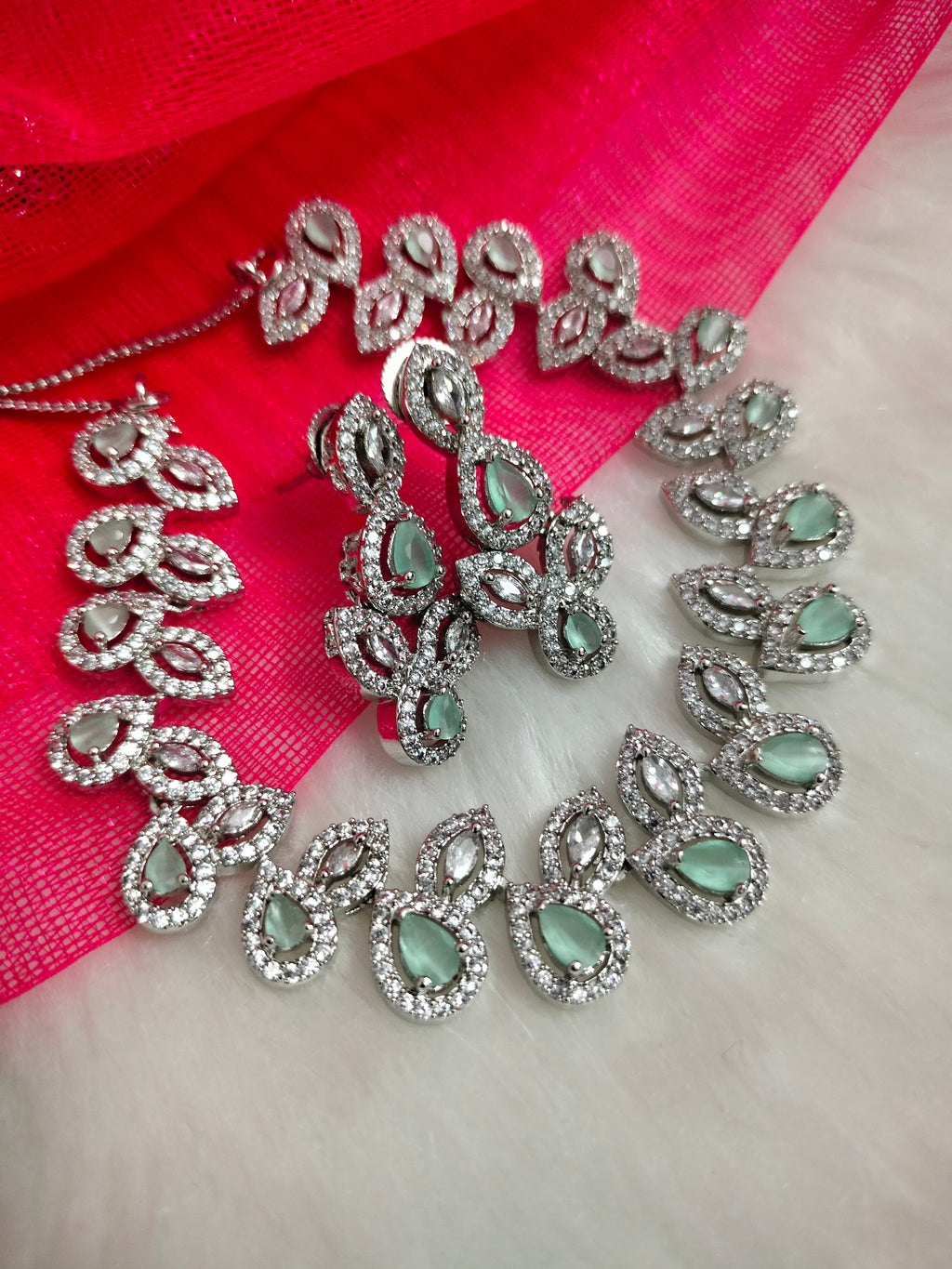 N01191_Grand Lovely designer Silver polished Necklace Set  embellished with American diamond stones with delicate Mint Green Stones .