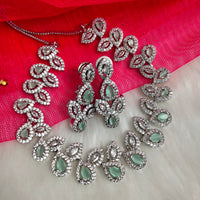 N01191_Grand Lovely designer Silver polished Necklace Set  embellished with American diamond stones with delicate Mint Green Stones .