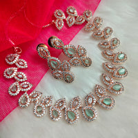 N01190_Grand Lovely designer Rose Gold polished Necklace Set  embellished with American diamond stones with delicate Mint Green Stones .