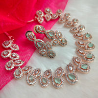 N01190_Grand Lovely designer Rose Gold polished Necklace Set  embellished with American diamond stones with delicate Mint Green Stones .