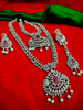 N01201_Elegant design Silver Polished American Diamond choker necklace studded with beautiful dazzling stones with delicate pink work.