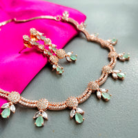 N01192_Grand Lovely designer Rose Gold polished Necklace Set  embellished with American diamond stones with delicate Mint Green Stones .