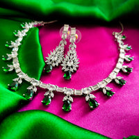 N02002_Classic silver polished choker style crafted design necklace set embellished with  green stones .