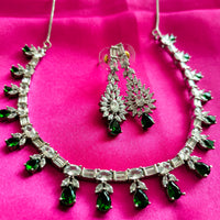 N02002_Classic silver polished choker style crafted design necklace set embellished with  green stones .