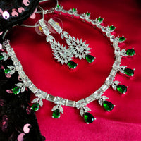 N02002_Classic silver polished choker style crafted design necklace set embellished with  green stones .