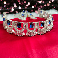 N02001_Classic silver polished choker style crafted design necklace set embellished with  blue stones .