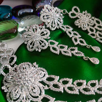 N03004_Classic Silver polished choker style crafted design necklace set embellished with  white stones .