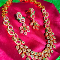 N0563_Classic matte gold polished temple jewelry style crafted design gold plated necklace set embellished with ruby and green stones .