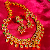 N0563_Classic matte gold polished temple jewelry style crafted design gold plated necklace set embellished with ruby and green stones .