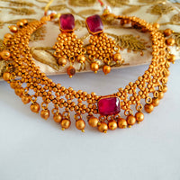 N03018_Classic matte gold polished temple jewelry style  crafted design gold plated necklace set embellished with ruby stones .