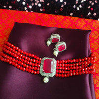 N0519_Classic crystal choker necklace set studded  with  American diamond stones with pearl drops.