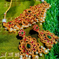 N03026_ classic matte gold polished temple jewelry choker style crafted design gold plated necklace set embellished with ruby and green stones .