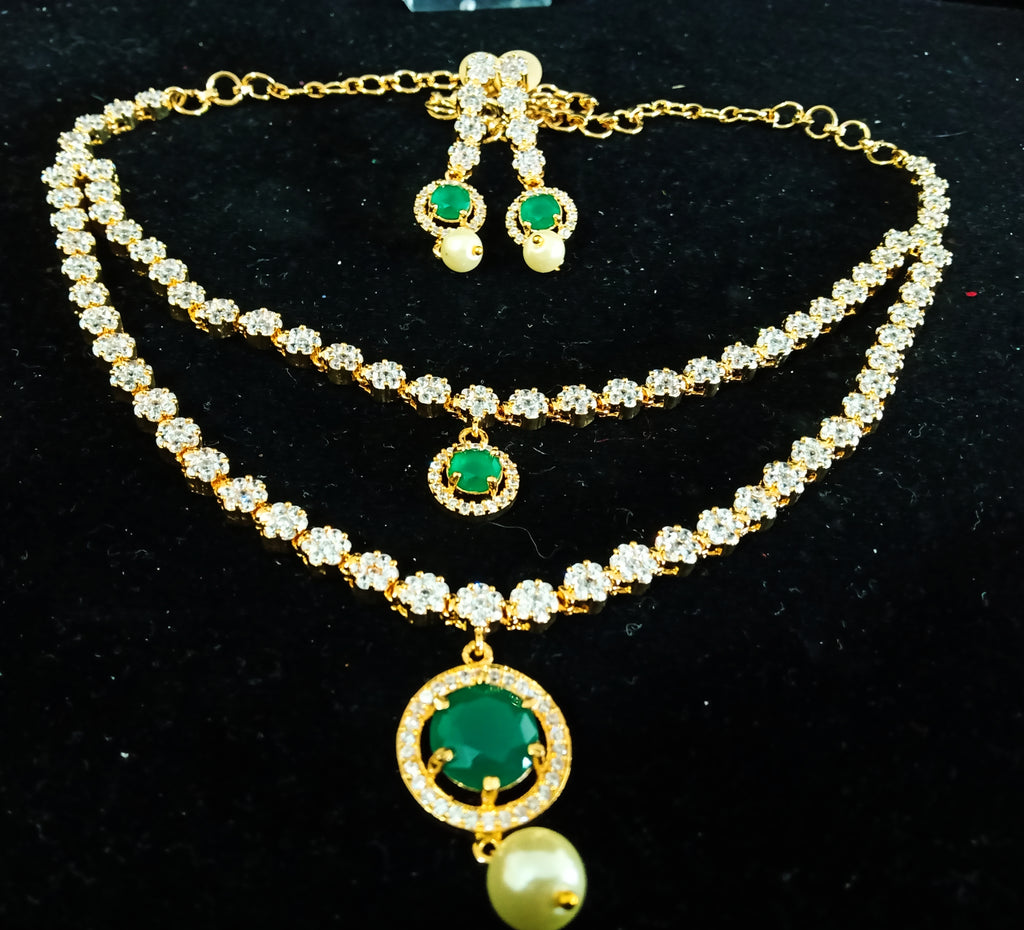 Pleasing and graceful necklace laden with exquisite work of American Diamond stones