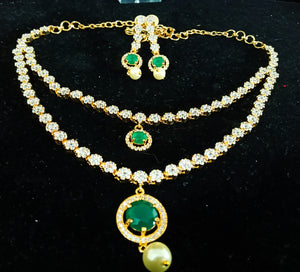 Pleasing and graceful necklace laden with exquisite work of American Diamond stones