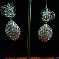 Sparkling Silver based earring with careful stitching of American Diamond