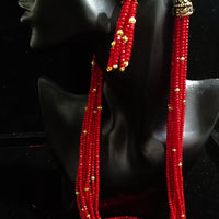 Pleasing and graceful necklace laden with exquisite work of red crystals, beautiful golden balls