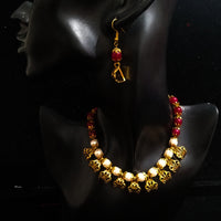 Pleasing and graceful Jaipur necklace laden with exquisite work of off white pearls .