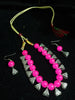 Pleasing and graceful Jaipur necklace laden with exquisite work of pink pearls .
