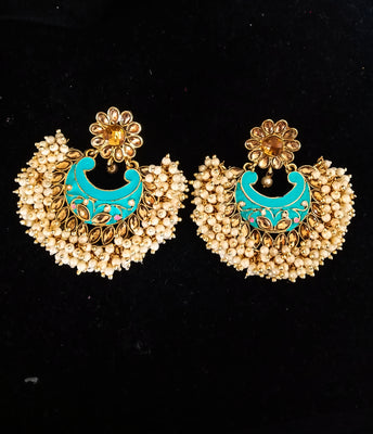 Classy Light Weight Firozi Colored Jumki Earring with delicate work of pearl and  Meenakari work.