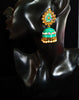 Classy Light Weight Ferozi Colored Jumki Earring with delicate work of pearl and  Meenakari work.