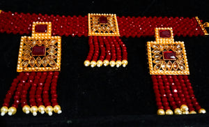 Grand Necklace with finest of Maroon Crystal based work over quality metal