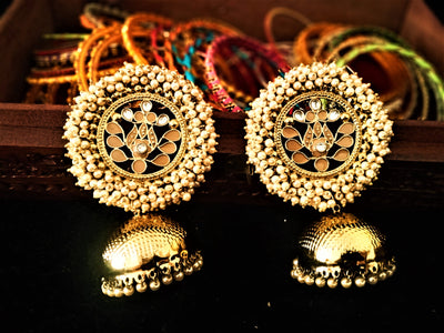 E0114_Classy golden colored earring with delicate work of pearl & peach colored semi precious stones and  Meenakari work.