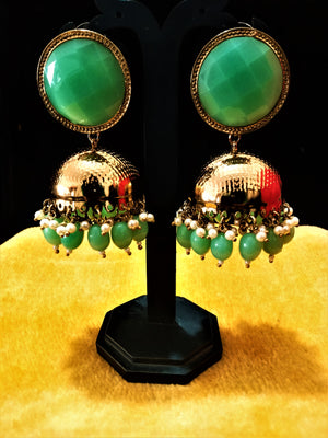 E0125_Classy Gold Color Meenakari jumkas studded with spring green color stones embellished with beads.