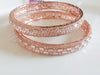 B047_ Classy Rose Gold plated bangles studded with  American Diamond stones.