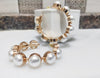 E0118_Classy premium pearl studded in golden half moon shaped ring earring.