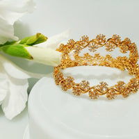 B0117_S_Lovely traditional Vintage Style Gold Plated along with american diamond studded Bangles.