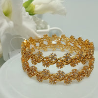 B0117_S_Lovely traditional Vintage Style Gold Plated along with american diamond studded Bangles.