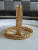 B062_Gorgeous Gold plated bangles studded with  American Diamond stones.