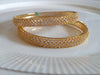 B060_Gorgeous Gold plated bangles studded with  American Diamond stones.