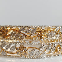 B063_Gorgeous gold plated bangles  studded with  American Diamond  stones.