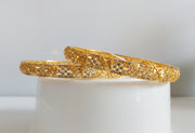 B064_Gorgeous Gold plated bangles  studded with  American Diamond  stones.