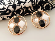 E0358_Classy stud earrings studded with black stones.