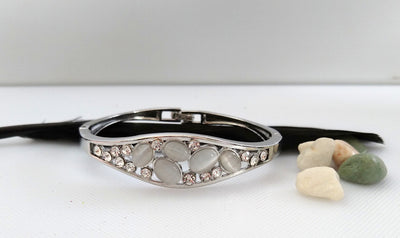 B0104_Elegant  metal base color  bracelet studded with  stones (Free size).